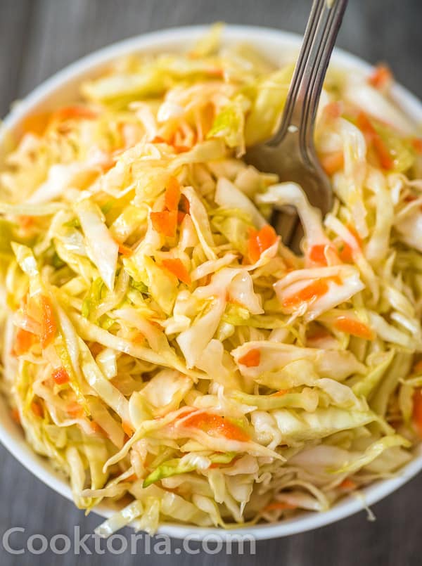 Pickled Cabbage in a bowl with a fork in it