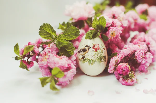 Almonds, bird, bloom, branches of almond, decoration, decorative eggs, decoupage, delicate flowers, easter, easter egg, eggs, flower, flowering shrub, fragrance, lush flowers, petals, pink flowers, pink petals, rose branches, rose tree, shrubs Stock Photo